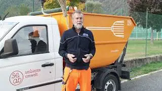 Cleaning a recycling island. A clean city starts with you.