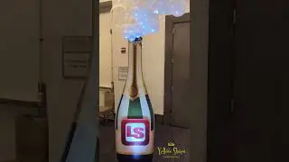 Champagne Bottle with Balloon Bubbles | Custom Event Decor by Yellow Shoes Event Rentals Chicago