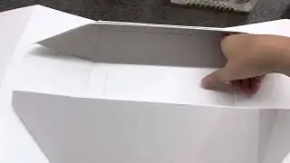 Robin explaining how Collapsible rigid box making process works