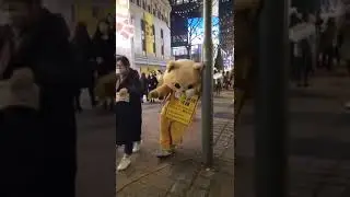 This furry fella giving out flyers