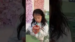 Drinking romantic strawberry smoothie at a romantic desert shop!