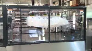 Modified dual in-feed bottle bagger / AIS Container Handling