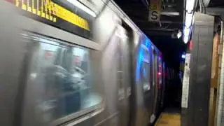 MTA BMT 14 St: 8 Av bound R160A-1 (L) train departing 1 Av