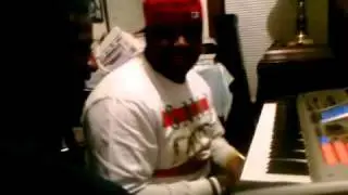 KG and Syk Sense in the studio making a hit record