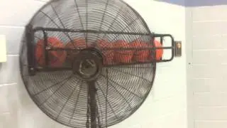 Lasko industrial stand fan at a gym.