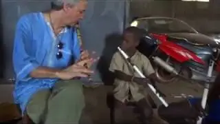 Teaching flute in Conakry