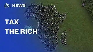Greenpeace volunteers create giant human Africa map for wealth tax campaign