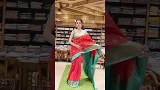 Elegant semi silk saree in a stunning orange and blue contrast.