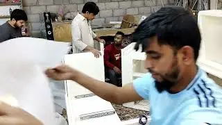 The electrician is doing the electrical work of the counter