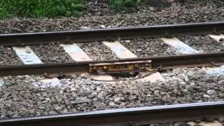 Siemens train passes over a bolted rail joint