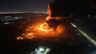 Huge explosions rock industrial area near Argentina's capital | AFP