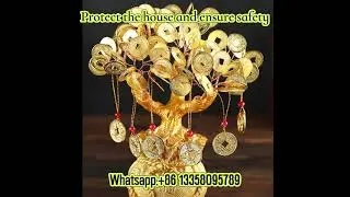This beautiful crystal tree with a money bag charm attracts wealth and positive energy to your desk.