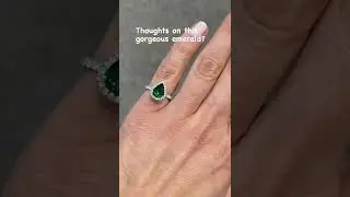 Green emerald engagement ring  halo pear shape made in hatton garden