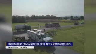 Firefighters contain diesel spill after truck overturns