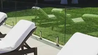 Glass pool fence