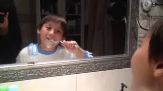 The happy tooth brush kid