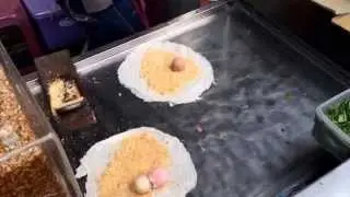 Making an ice cream, cilantro, and peanut crepe (Yingge, Taiwan)
