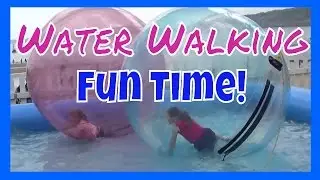 Walking on Water Balls Aqua Orbs Scarborough Seafront. Kids Having Fun with Water Balls Bubbles