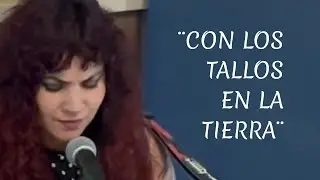 Graci Rodríguez (Con los tallos en la tierra)