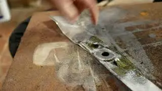 Laser Cleaning 200W - Rust Removal from Mower Blade | High-Power Pulsed Laser Cleaning
