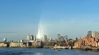 Incredible shard of sunlight bouncing out from The Shard, London.