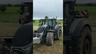 Modern Tractor Ploughing  Farming with Tractor in Agricultural Field