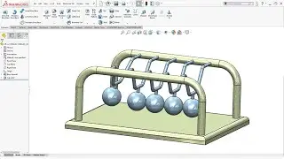 SolidWorks motion study | Newton toy in solidworks
