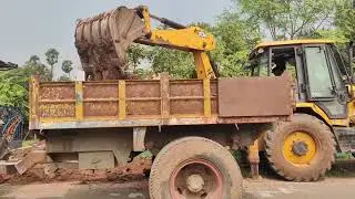 JCB 3DX || Road Widening Work: backhoe loader Loading Soil into Mahindra Tractor || jcb video..