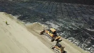 Liner and soil cement placement