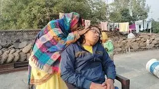 Boy Nitpicking In Long Hair