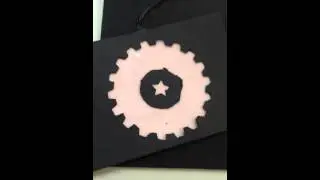 Flashing Capital Factory gear logo with an electroluminescent (EL) panel