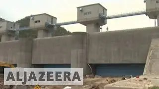 Стена японской деревни выдержала цунами