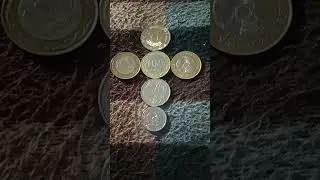 МОНЕТЫ: 1 по 200, 3 по 100, 1 по 50 и 1 по 20 ТЕНГЕ лежат на байковой поверх 11 Января