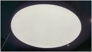 Barrisol stretch ceiling with backlit circle shape
