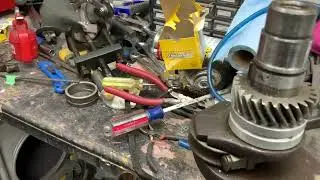 Replacing the rod bearings and installing the timing and distributor gear.