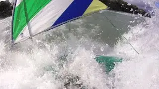 Sunfish sailing and capsize in the surf