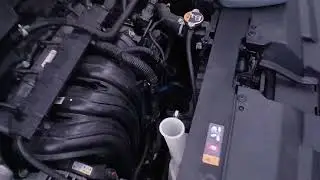2025 and up Kia k4, topping up engine coolant.