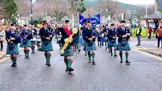 Ballater Pipe Band leading the 2025 Little Masons Parade through town of Ballater in Scotland