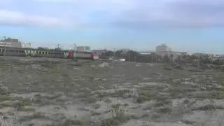 CP 5600 loco + intercity set and a 3400 UME (EMU) passes north of Espinho