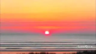 Tim Janis | Sunrise Over the Ocean