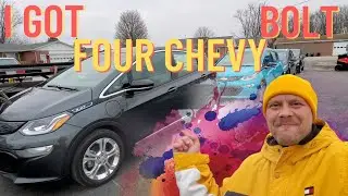 Crazy Russian.Loading 4 Chevy electric cars on 3 car trailer.
