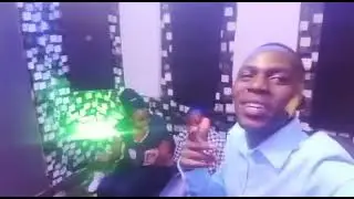 MINISTER MOSIRO;SAFARI[during the making of the song in Warid Worldwide studios]