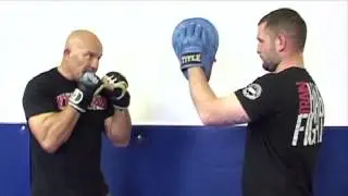 Machine MMA Stand Up. The left hook.