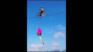 Mind blowing. 🤯high-altitude steel wire performance in Beidi Mountain, Guangxi, China.