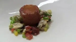 Chef Patron Gilles Goujon prepares a signature dish