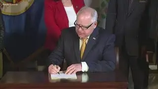 Governor Tim Walz signs coronavirus funding bill