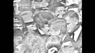 Scenes of the president and his wife greeting crowds at Dallas's Love Field