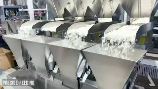 Motorised 4 head linear weigh filler used for poha , puffed rice , makhana packaging.
