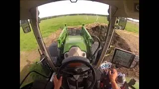 Fendt 718 moving manure cab view