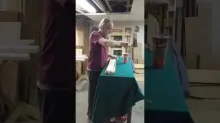 Rubbering a pool table rail -cutting facings